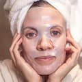 Woman wearing a sheet mask