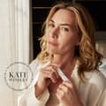 Kate Winslet holding The Solution stick