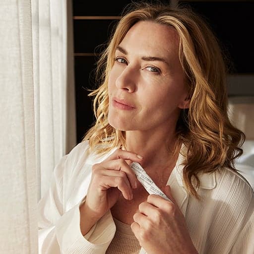 Kate Winslet holding a collagen stick