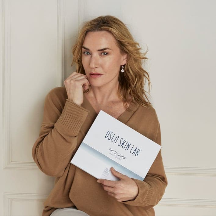 Kate Winslet holding The Solution