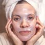 Woman wearing a sheet mask
