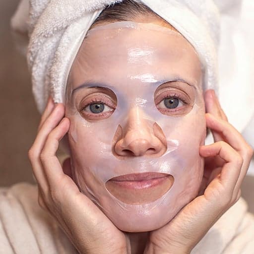 Woman wearing a sheet mask
